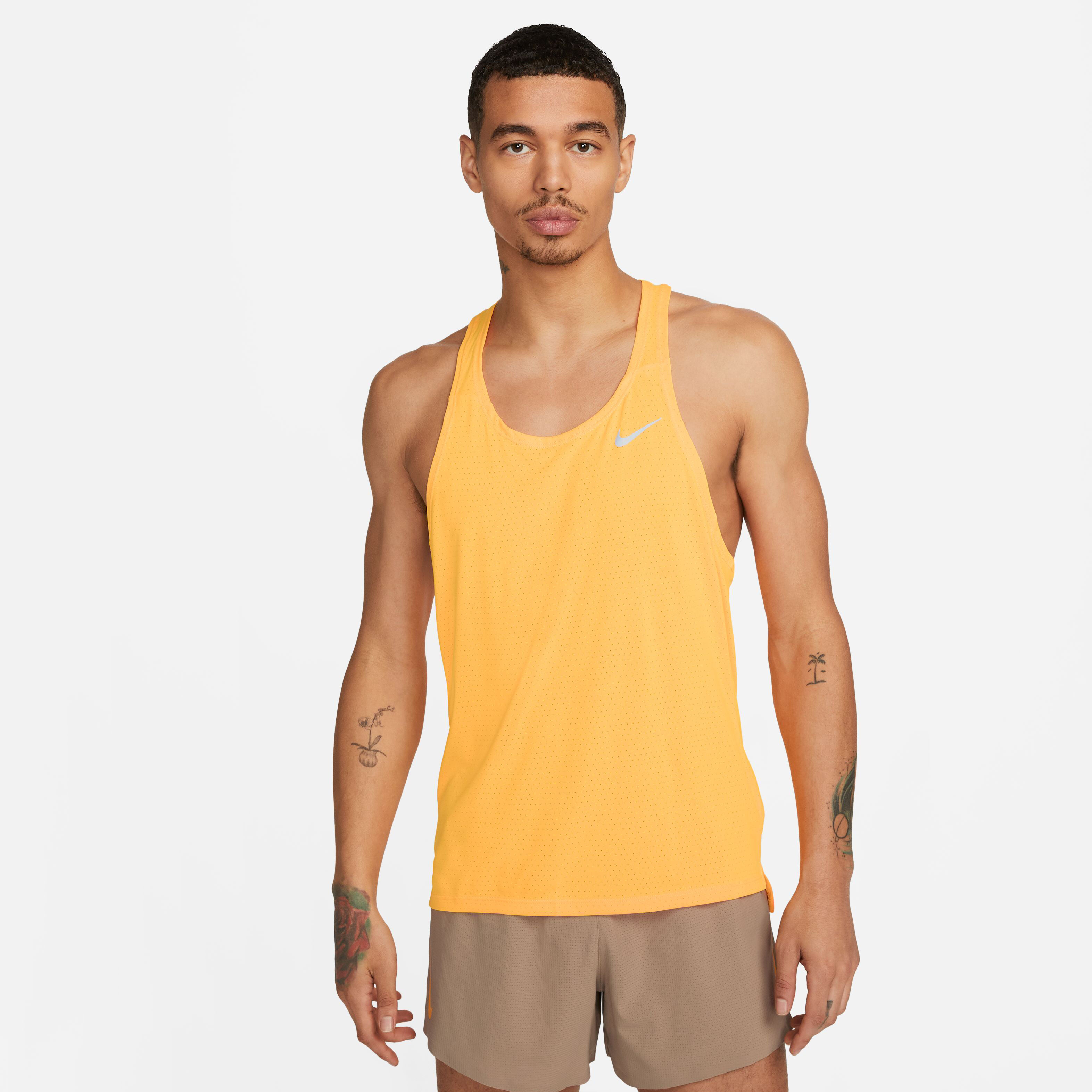 Nike yellow running top on sale