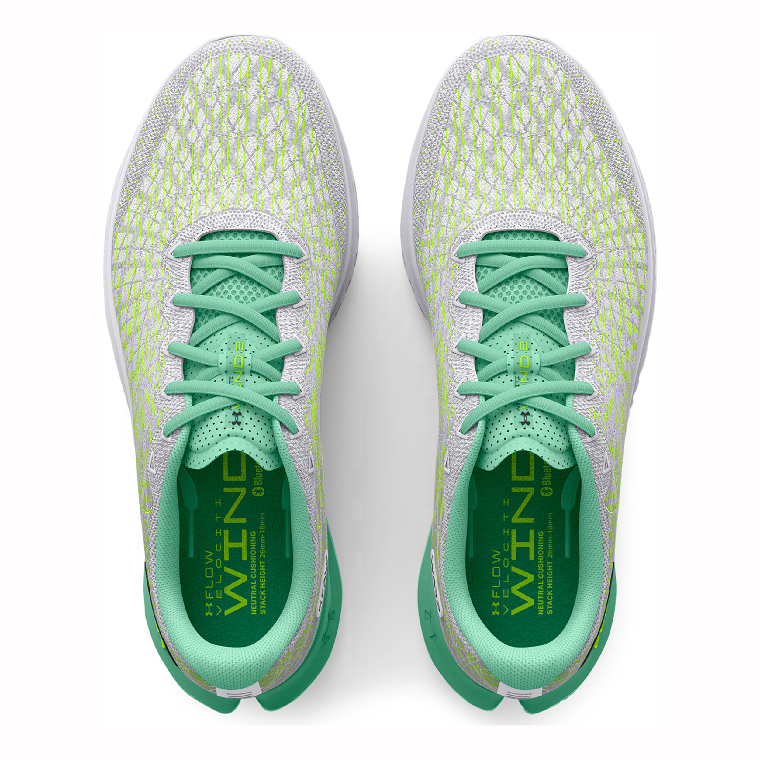 Green and white under armour shoes 2025