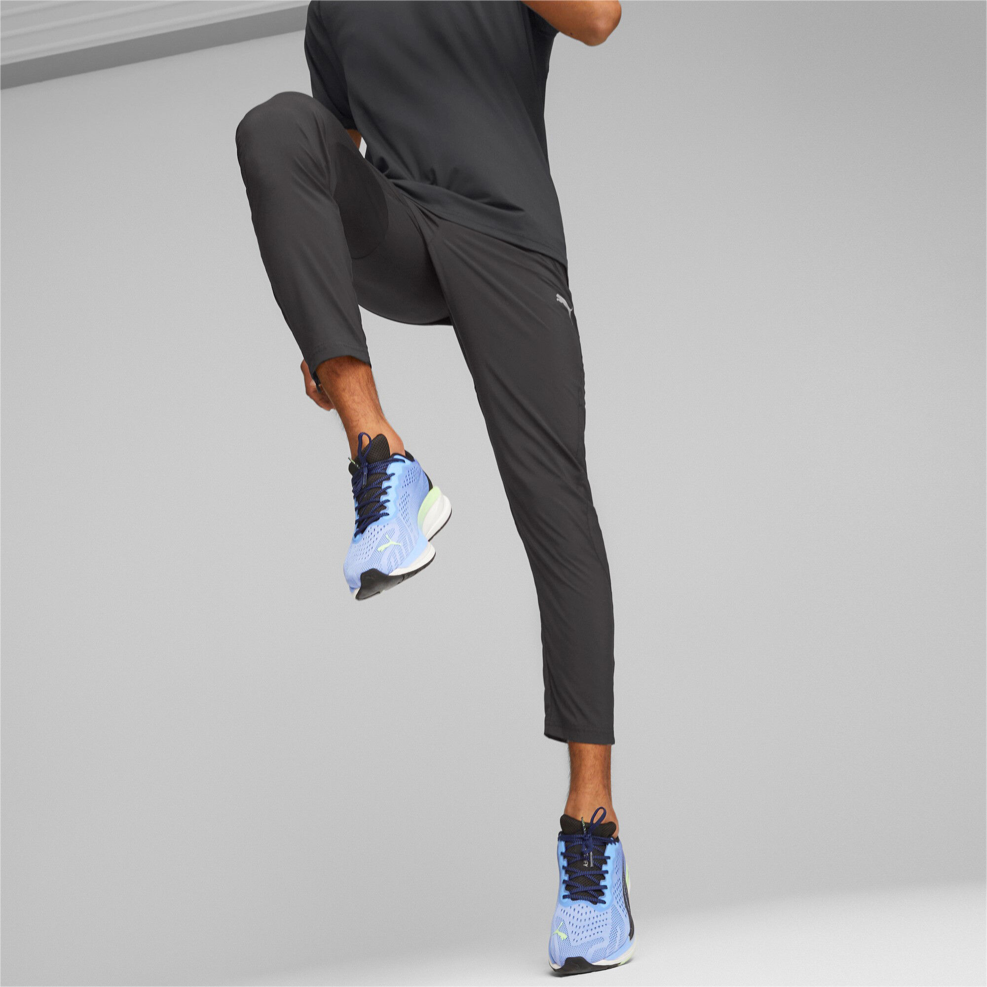 Buy Puma Run Tapered Woven Running Pants Men Black online