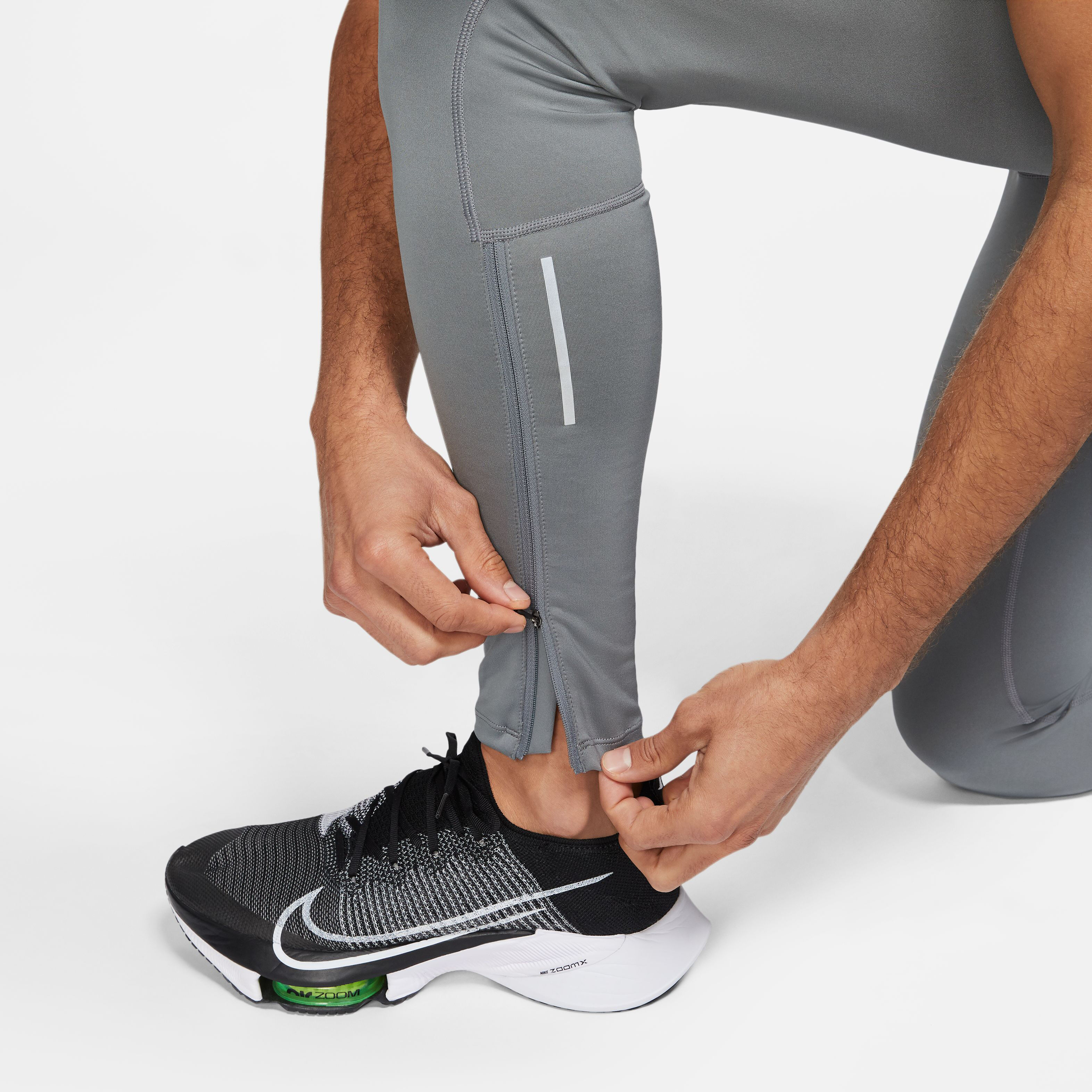 Buy Nike Dri Fit Challenger Tight Men Grey Silver online Running Point COM